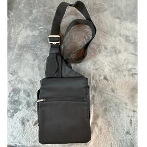 Black Travelon anti-theft crossbody bag for travel and commuting